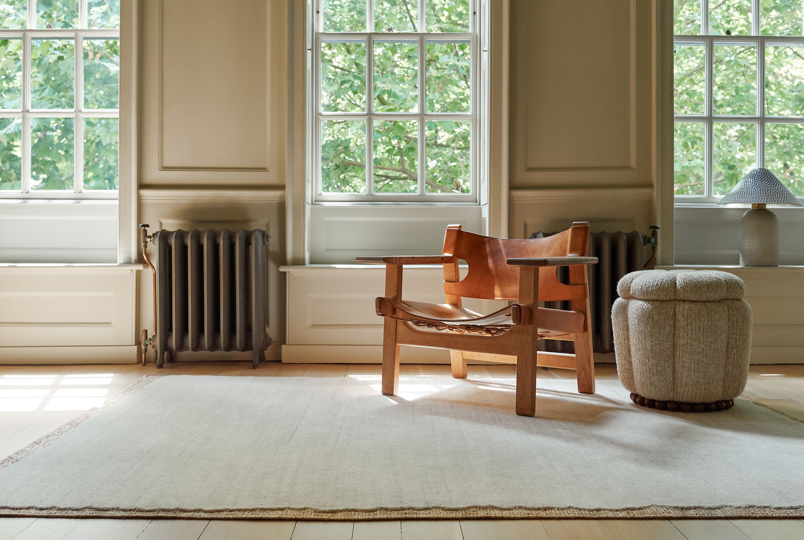 Image may contain: Home Decor, Rug, and Furniture