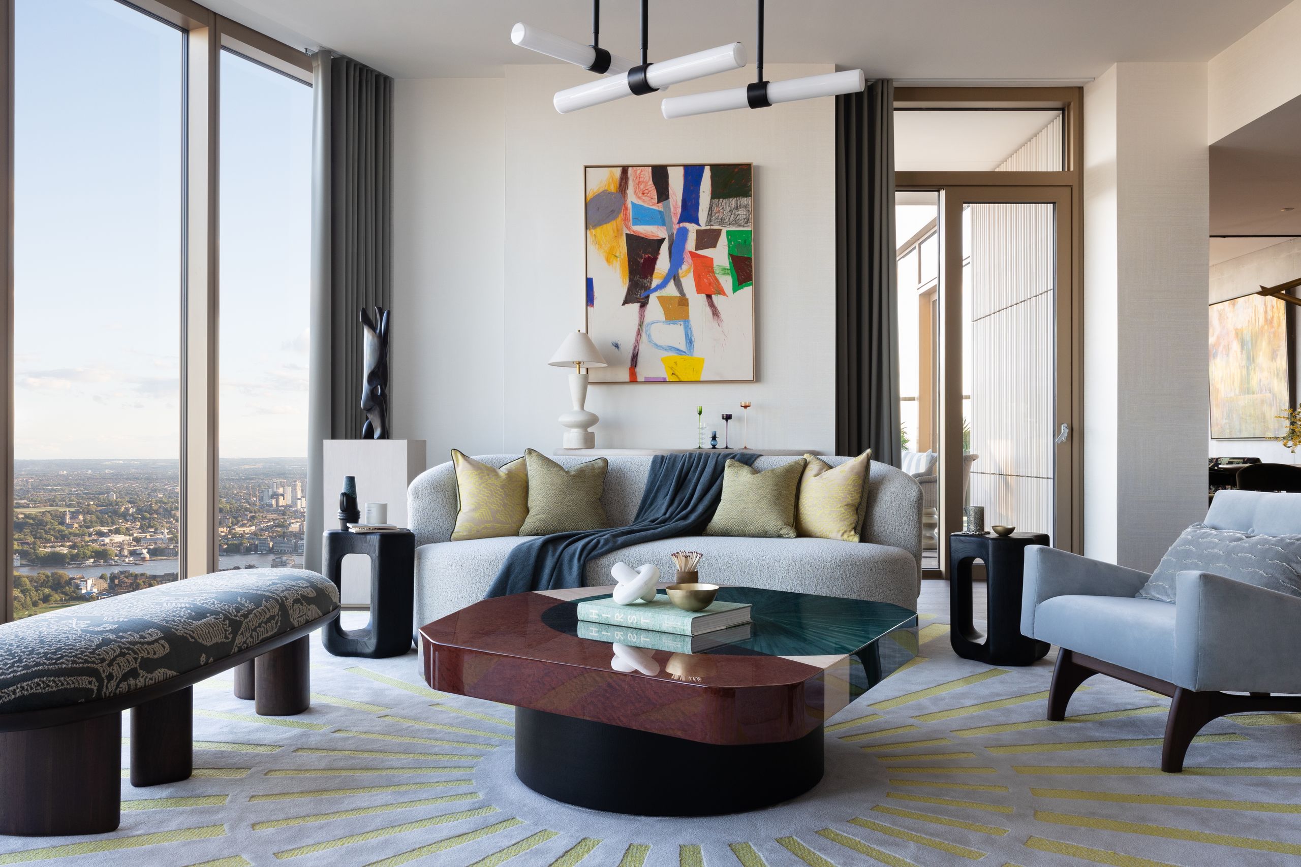 Image may contain: Coffee Table, Furniture, Table, Home Decor, Couch, Lamp, Architecture, Building, Indoors, and Living Room