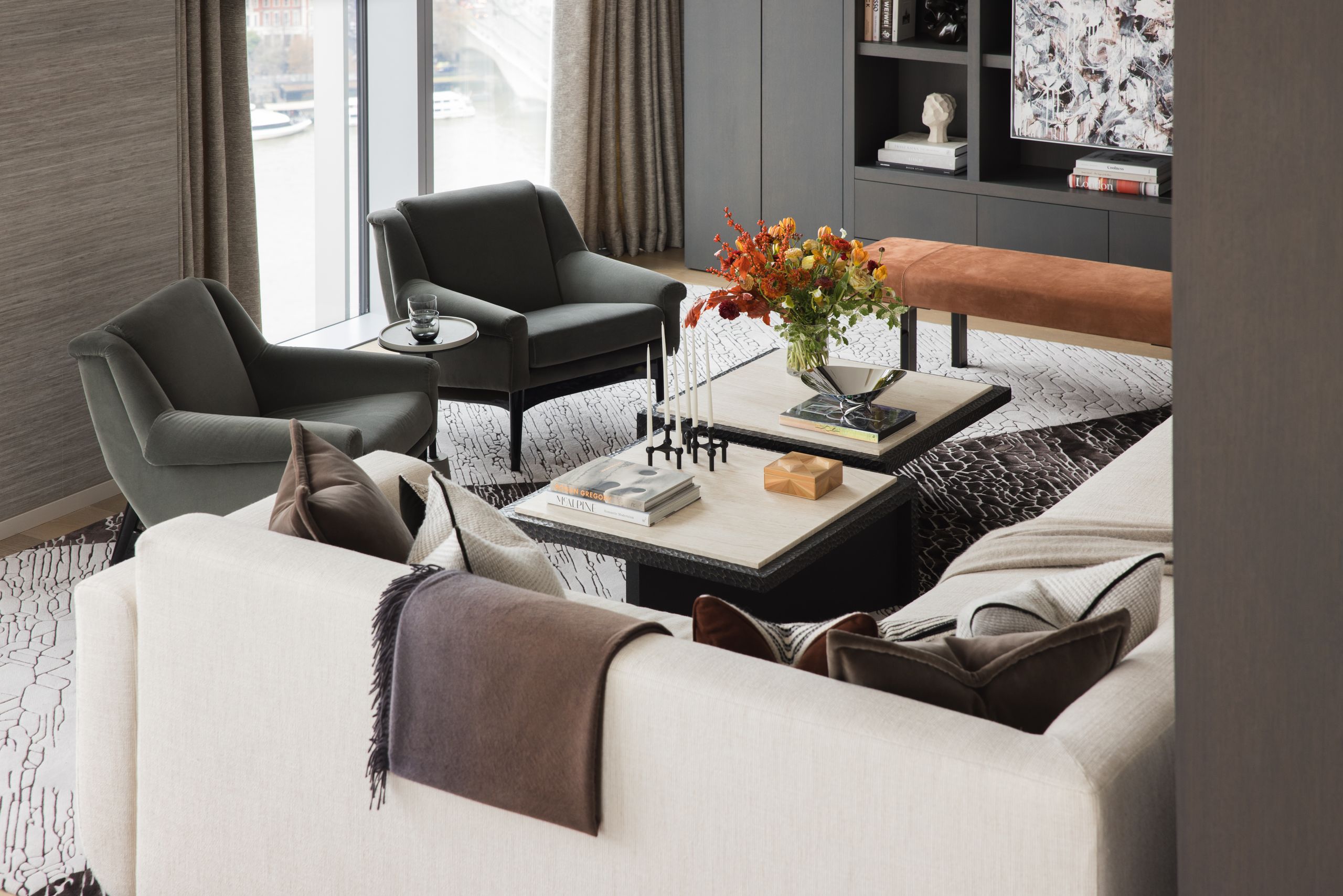 Image may contain: Home Decor, Furniture, Table, Couch, Coffee Table, Architecture, Building, Indoors, Living Room, and Room