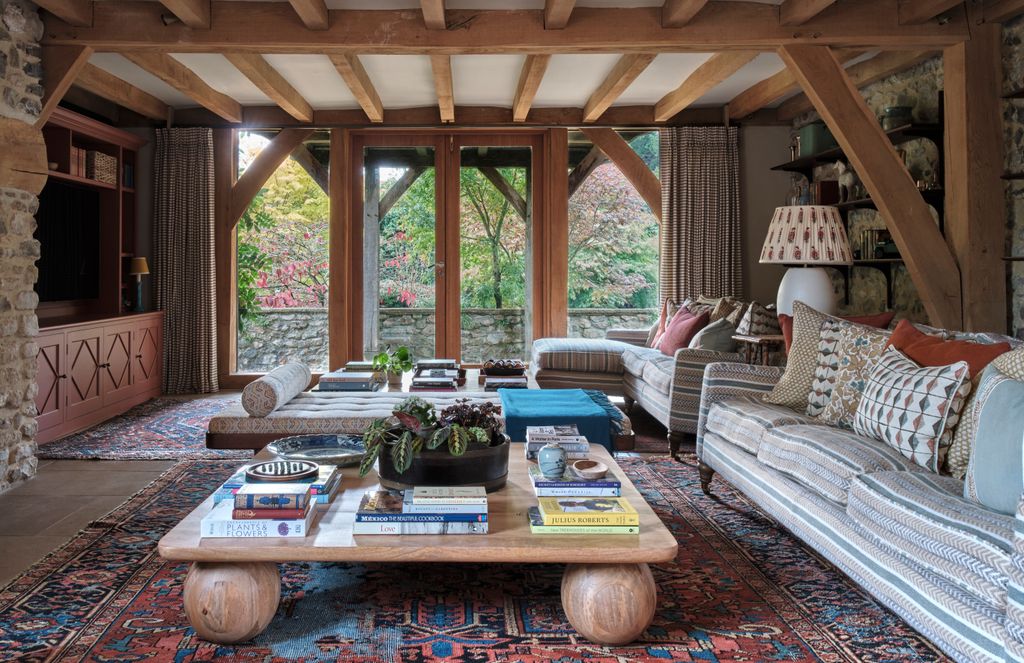 Image may contain Coffee Table Furniture Table Home Decor Architecture Building Indoors Living Room Room and Rug