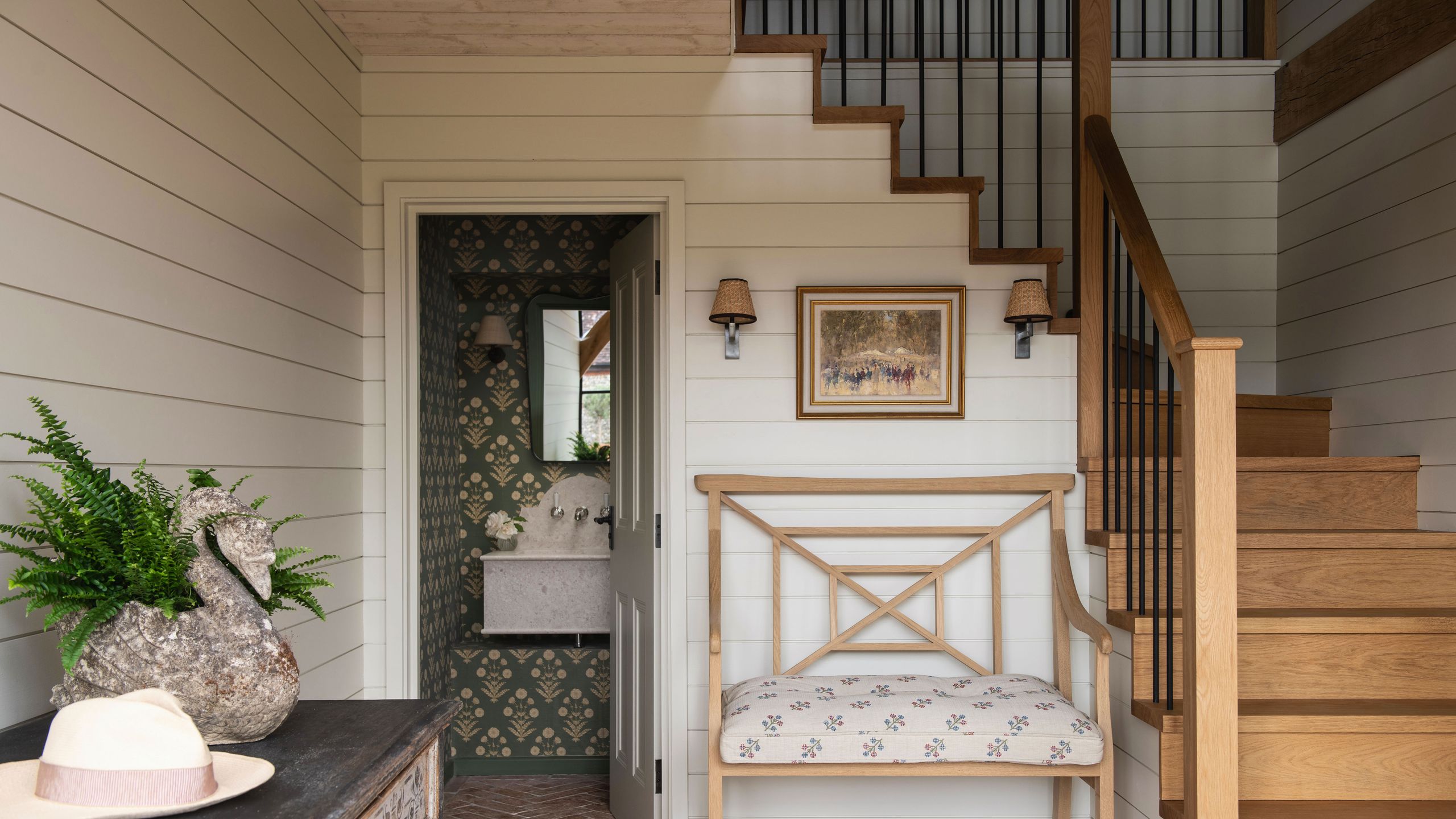 Image may contain: Indoors, Interior Design, Lamp, Plant, Architecture, Building, House, Housing, Staircase, Foyer, and Bed