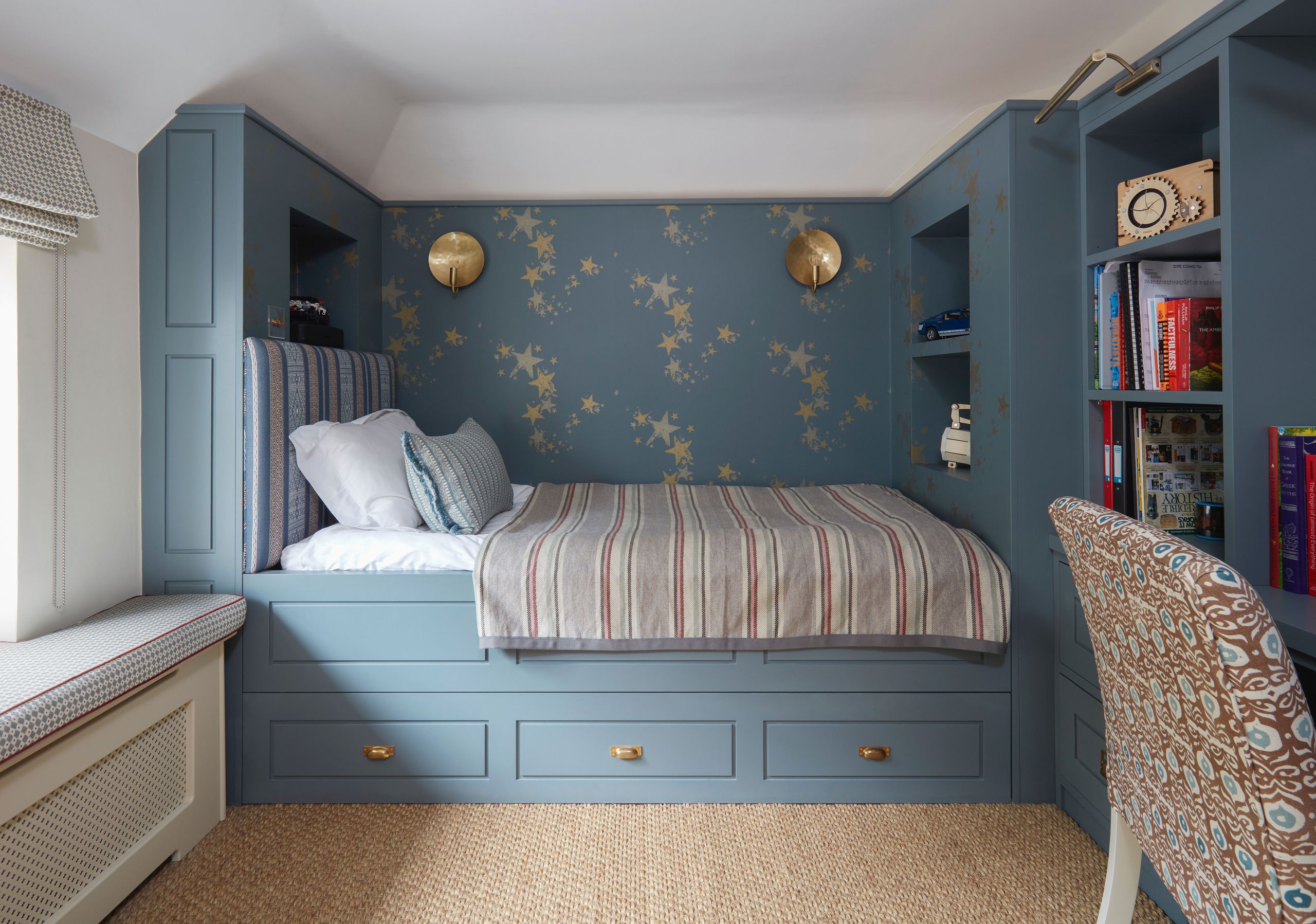 Image may contain: Home Decor, Chair, Furniture, Cushion, Corner, Lamp, Indoors, Interior Design, Bed, Bedroom, and Room