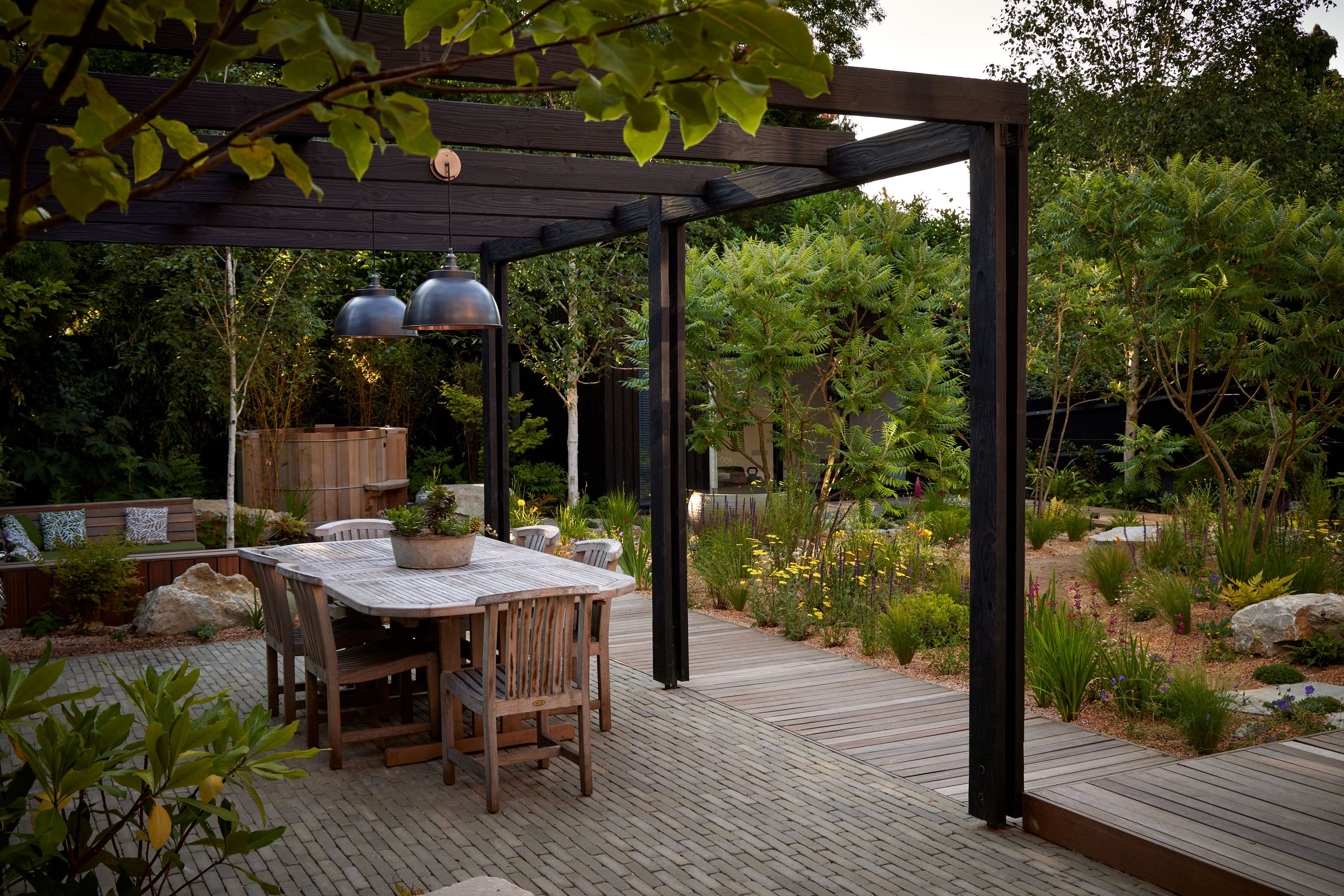 Image may contain: Architecture, Building, House, Housing, Porch, Patio, Indoors, Interior Design, Pergola, and Desk