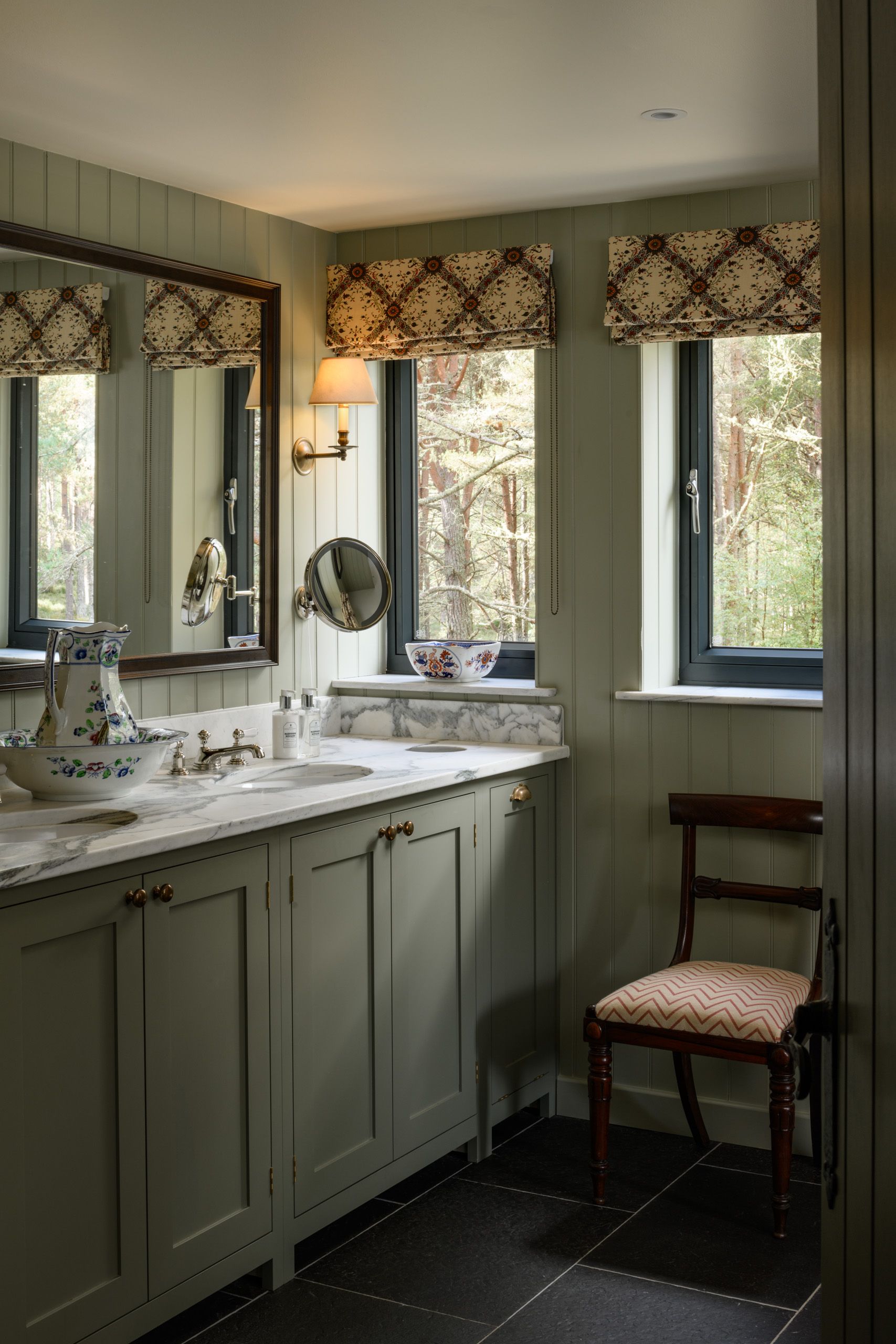 Image may contain: Lamp, Chair, Furniture, Indoors, Interior Design, Sink, Sink Faucet, and Window