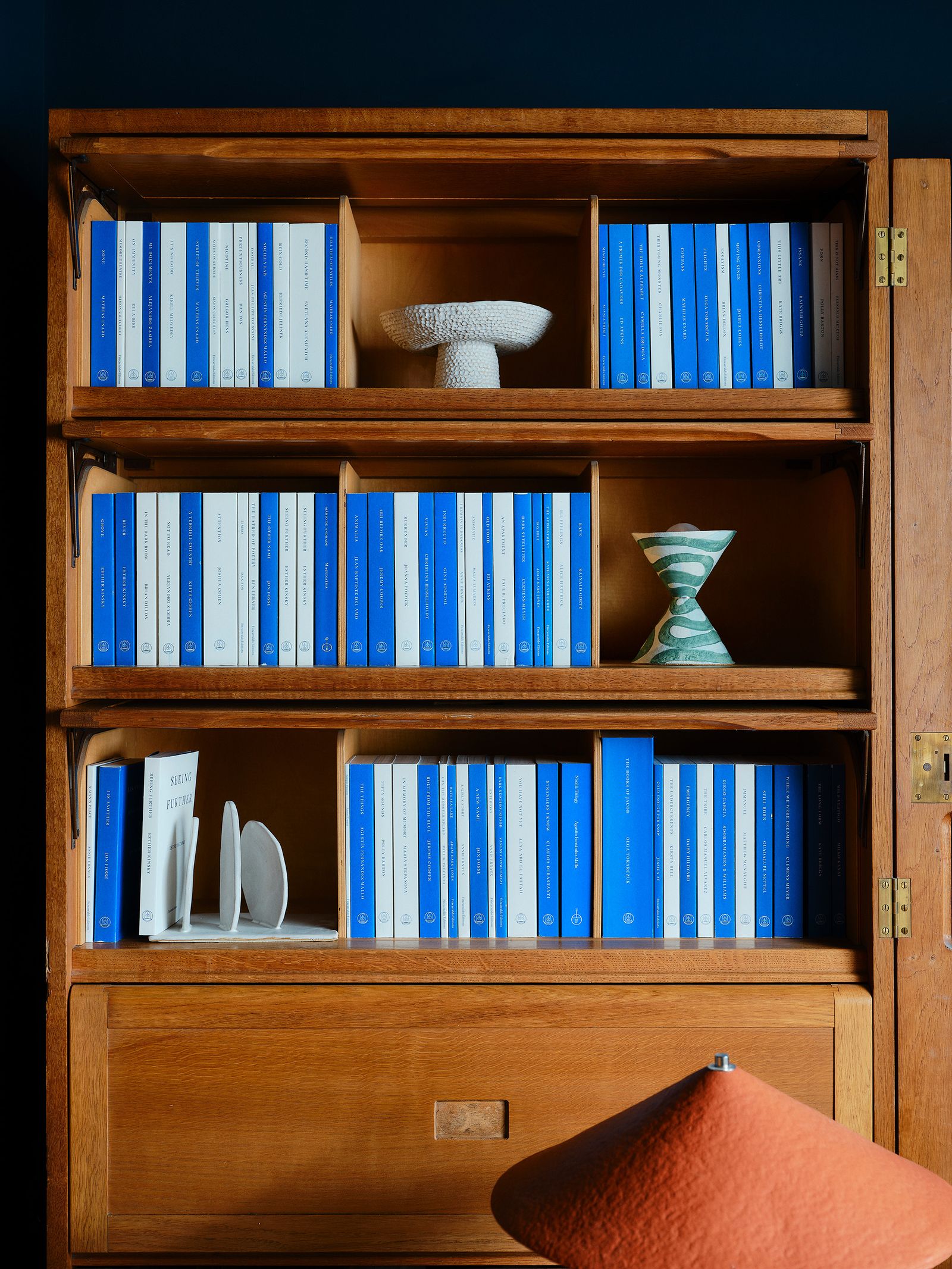 Image may contain Furniture Bookcase Plate and Shelf