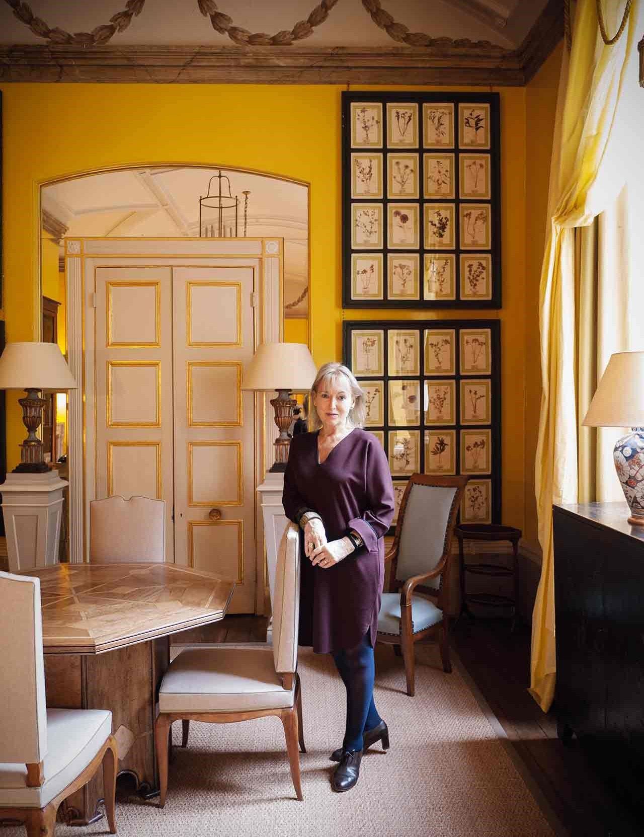 Image may contain Person Adult Dining Table Furniture Table Architecture Building Dining Room Indoors and Room