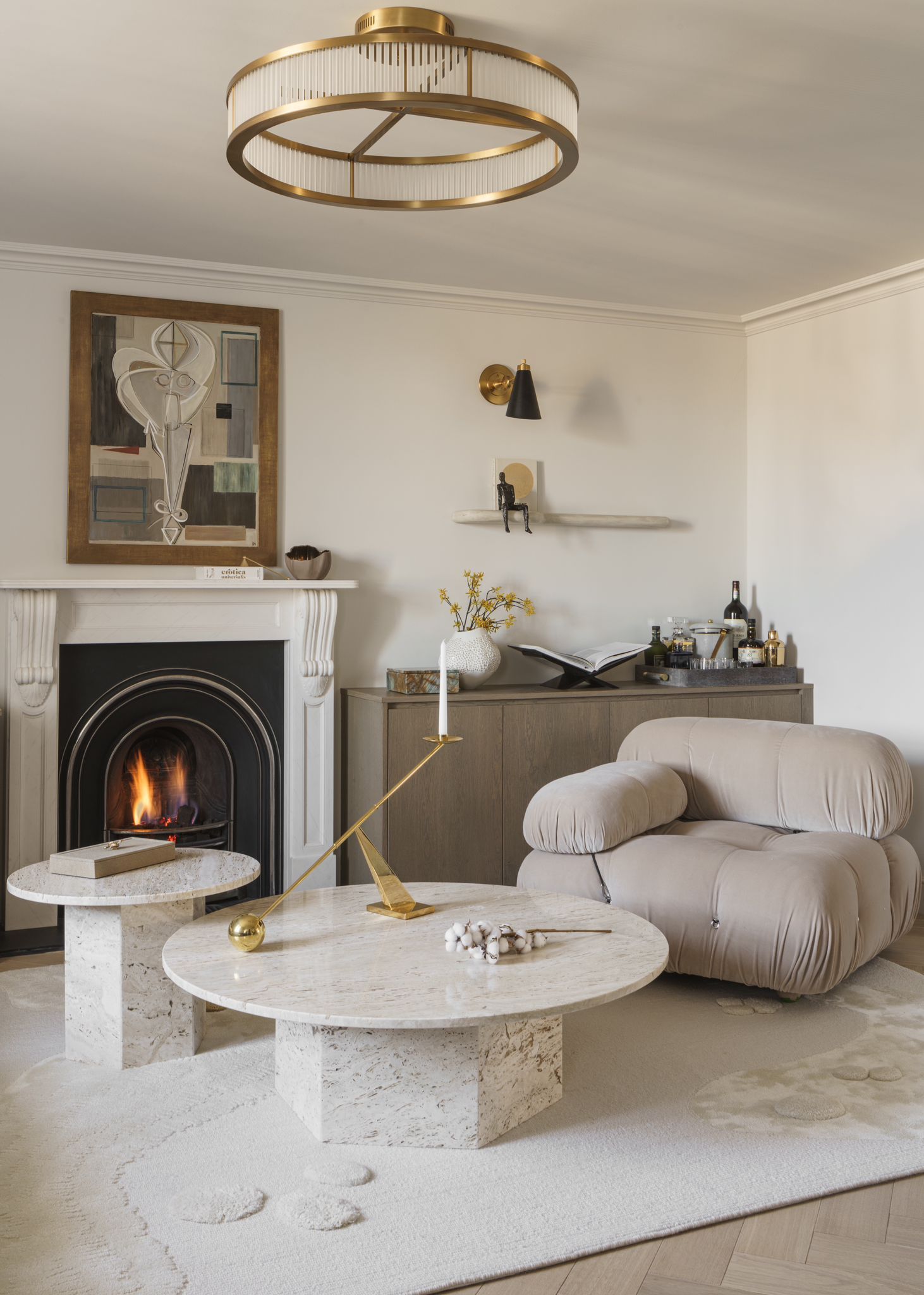 Image may contain: Coffee Table, Furniture, Table, Fireplace, Indoors, Home Decor, Interior Design, Candle, and Architecture