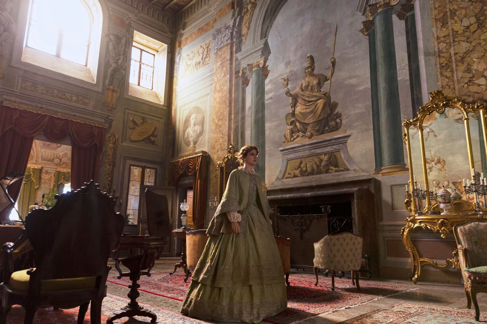 Image may contain Chair Furniture Adult Person Wedding Indoors Candle Desk and Table