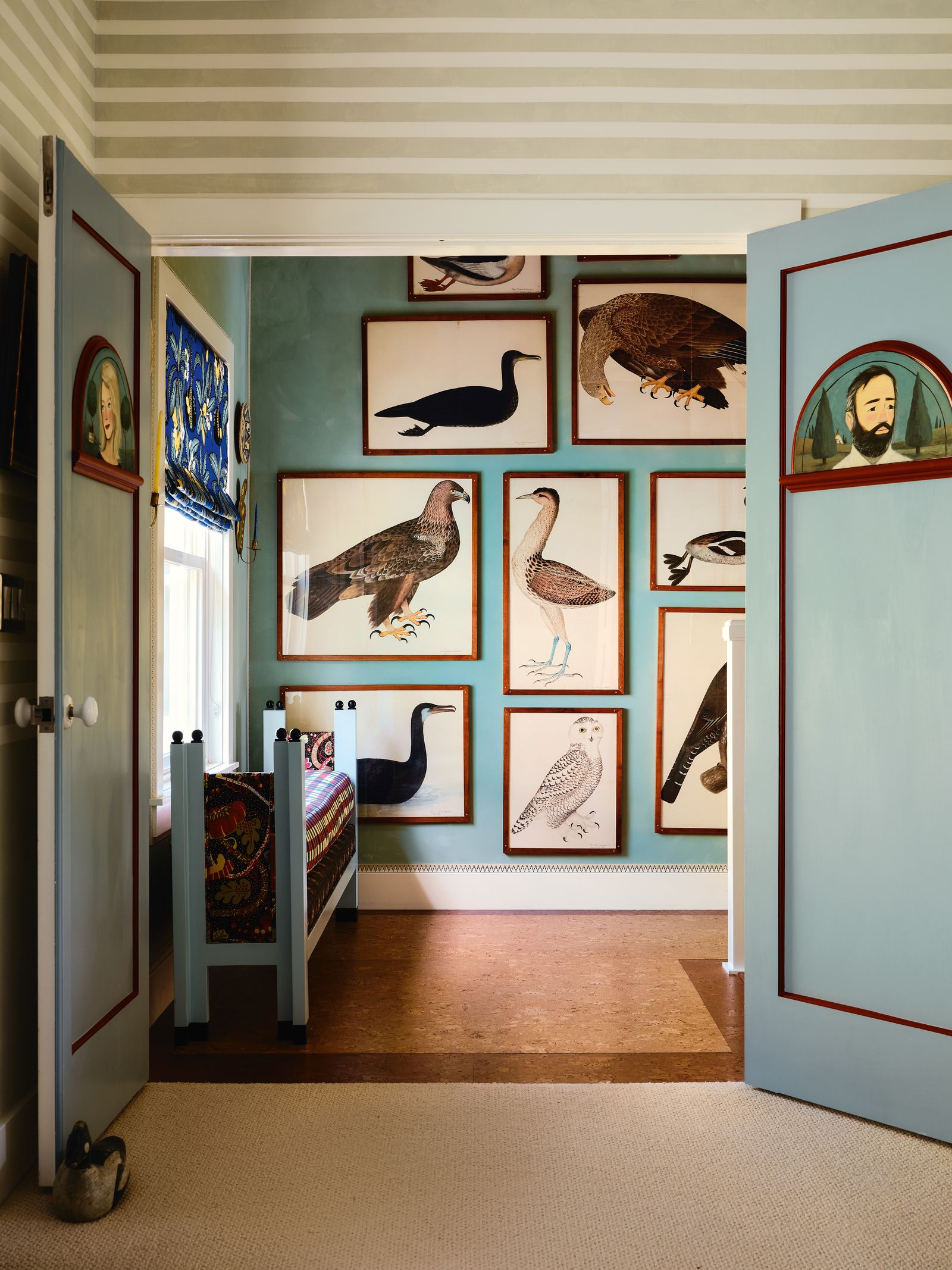 Image may contain Indoors Interior Design Person Art Painting Bed Furniture Animal Bird Accessories and Bag