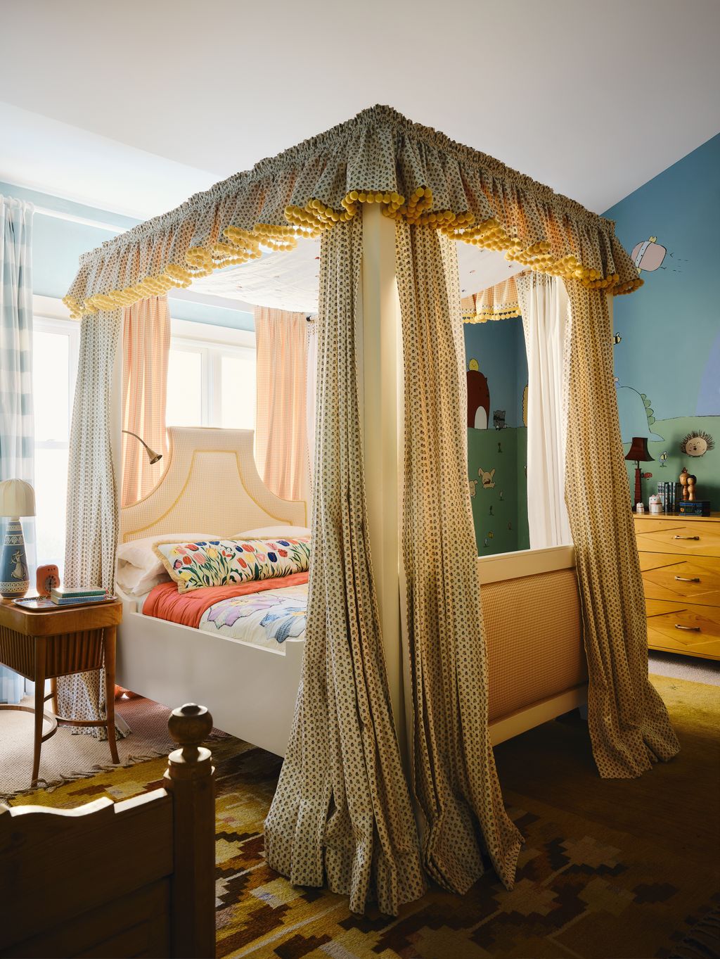 Image may contain Furniture Bed Bedroom Indoors Room Lamp Desk Table and Canopy Bed