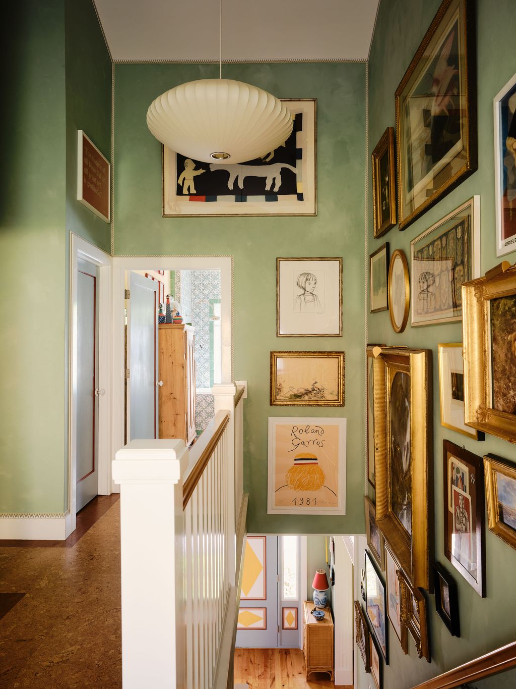 Image may contain Art Painting Lamp Indoors Interior Design Architecture Building Foyer and Person