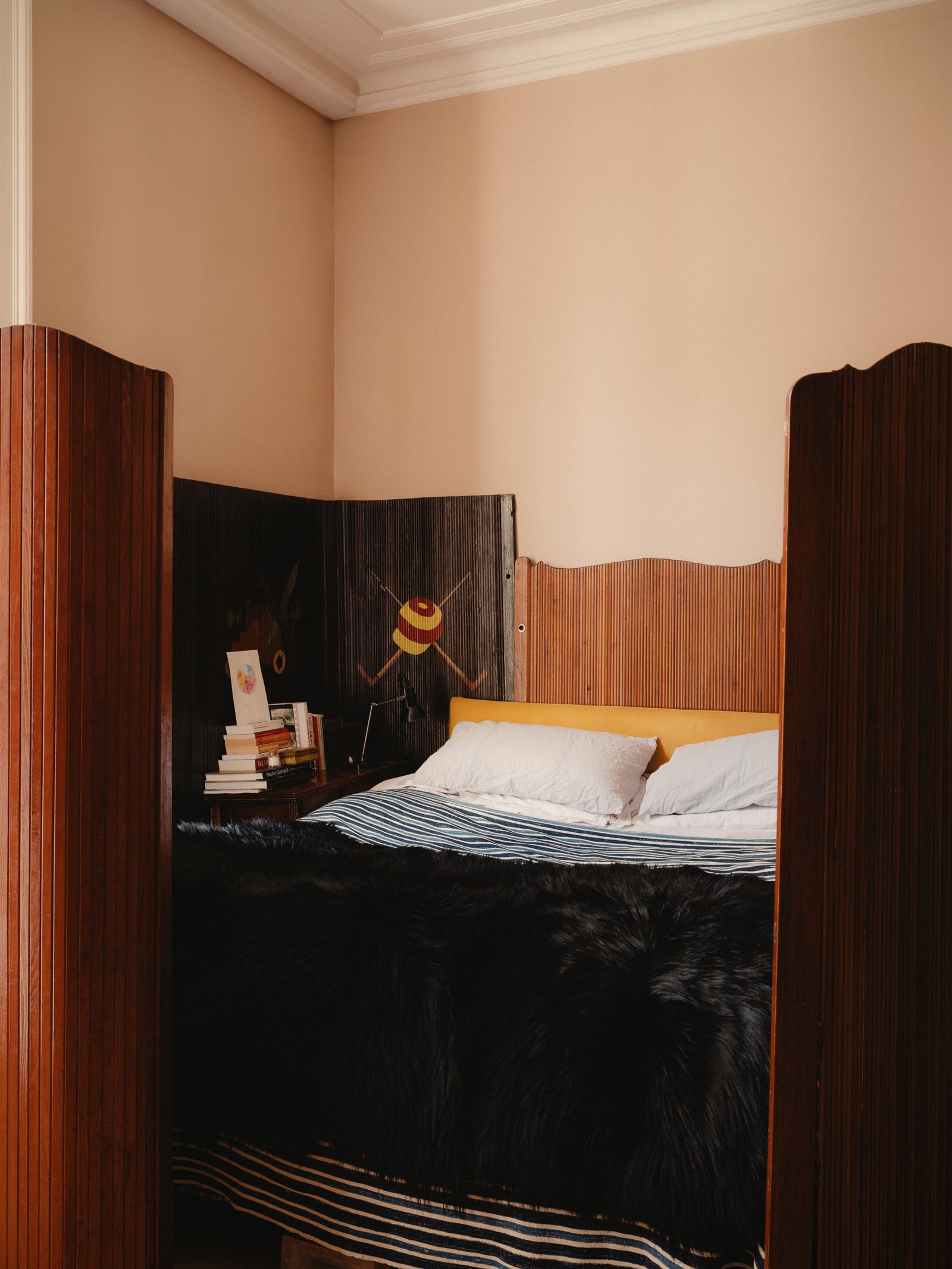 Image may contain Indoors Interior Design Bed Furniture Bedroom Room Dorm Room Wood Panels and Wood