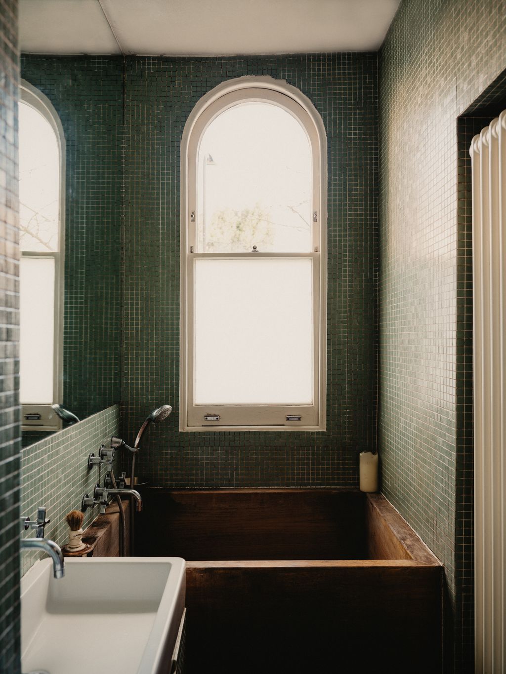 Image may contain Sink Sink Faucet Bathing Indoors Interior Design Bathtub Person and Tub