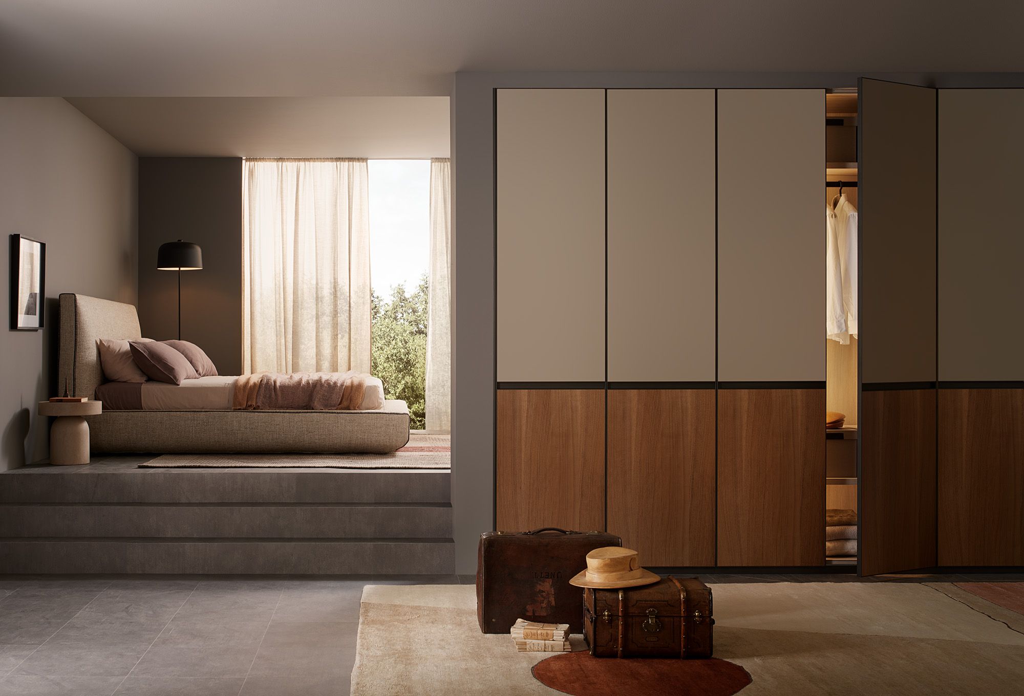 Image may contain: Indoors, Interior Design, Lamp, Furniture, Accessories, Bag, Handbag, Closet, Wardrobe, Bed, and Clothing