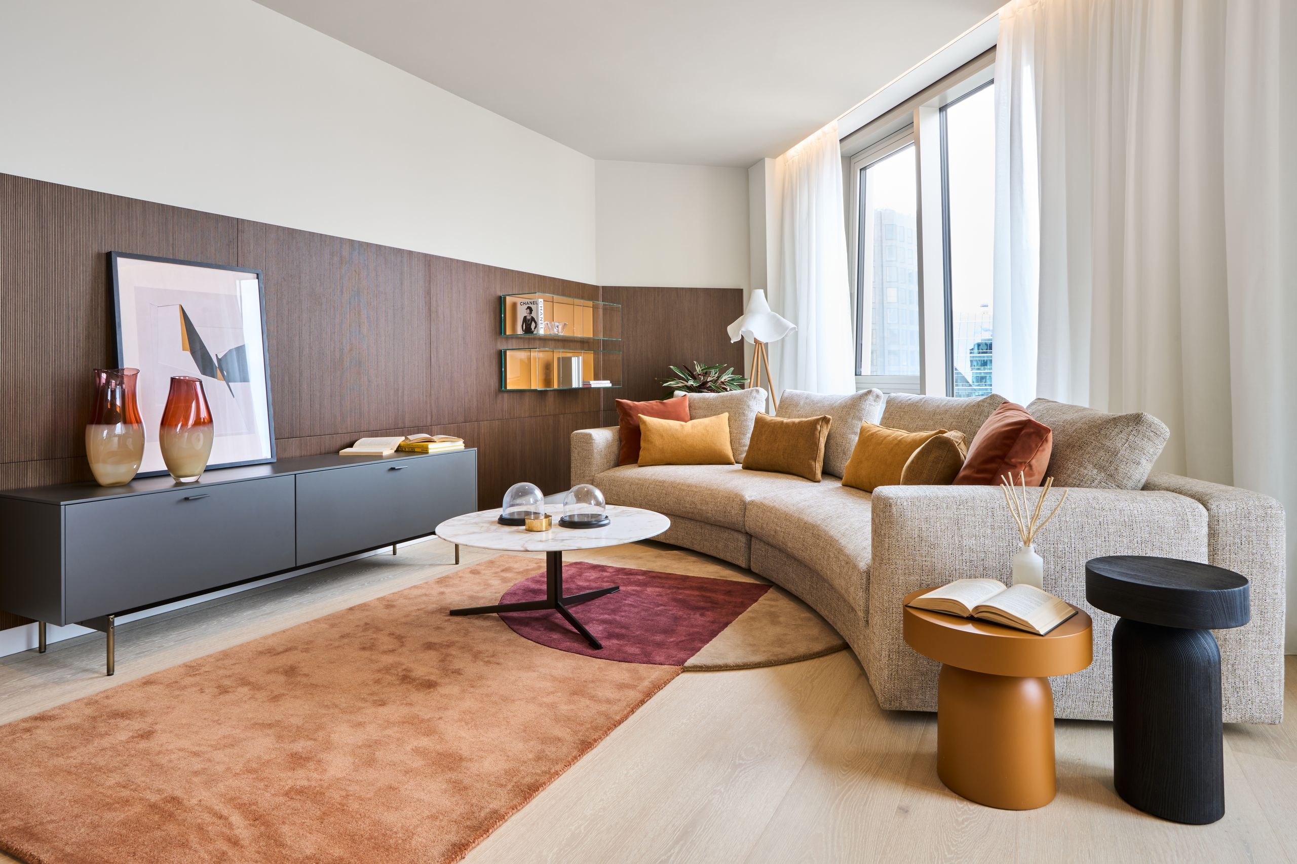 Image may contain: Home Decor, Book, Publication, Coffee Table, Furniture, Table, Architecture, Building, and Indoors