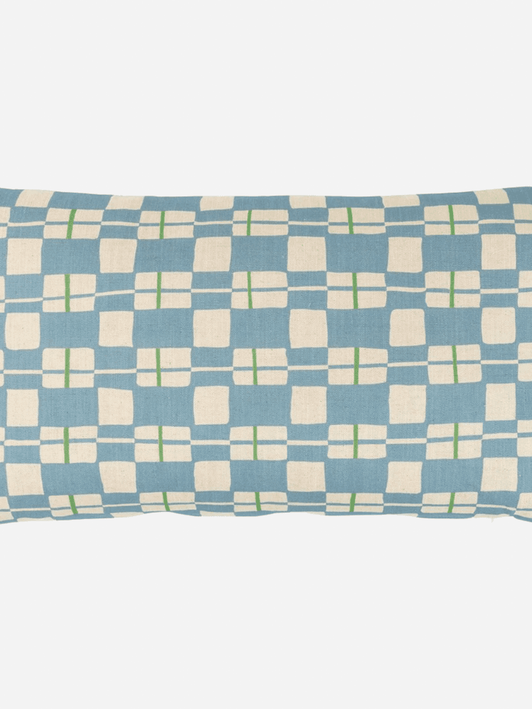 Image may contain: Cushion, Home Decor, Pillow, Clothing, and Skirt