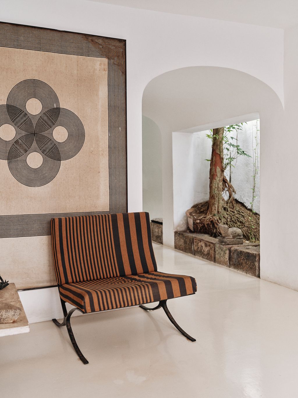 Image may contain Indoors Interior Design Furniture Floor Bench Architecture Building Wall and Home Decor