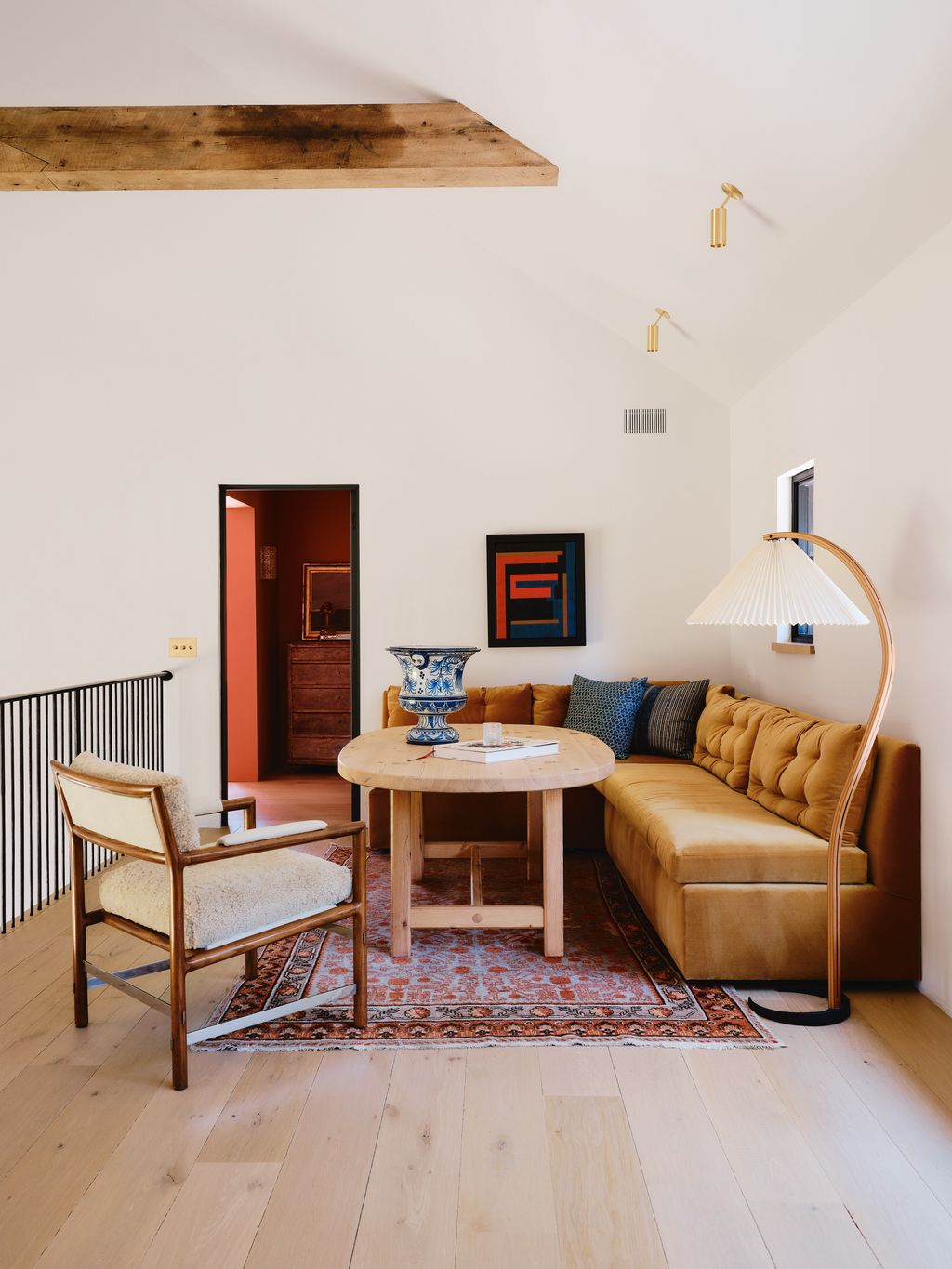 Image may contain Home Decor Indoors Interior Design Chair Furniture Architecture Building Living Room and Room