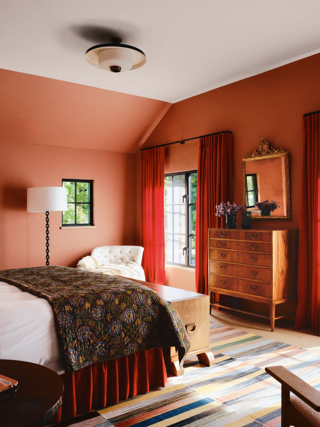 Image may contain Lamp Plant Chair Furniture Bed Desk Table Home Decor Indoors Interior Design Cabinet and Couch