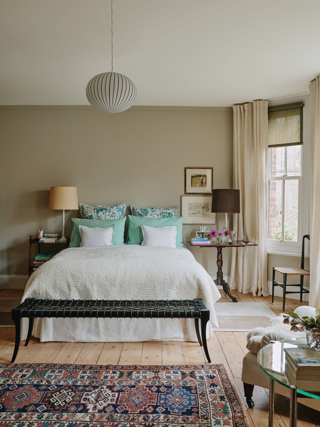 Image may contain Home Decor Lamp Chair Furniture Rug Cushion Desk Table Art Painting Indoors and Interior Design