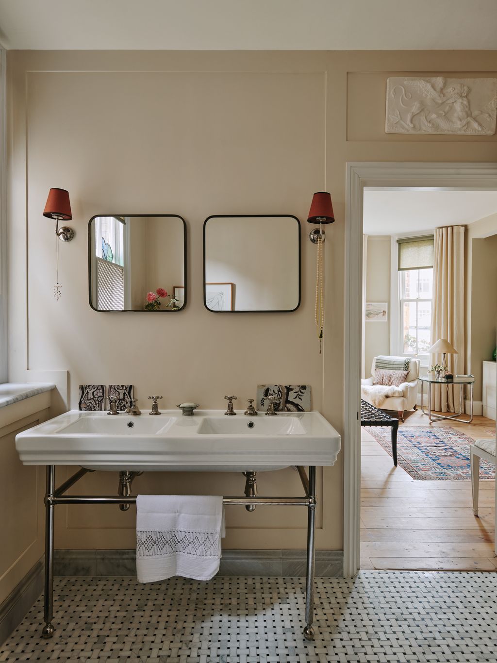 Image may contain Lamp Desk Furniture Table Home Decor Rug Double Sink Sink Sink Faucet and Chair