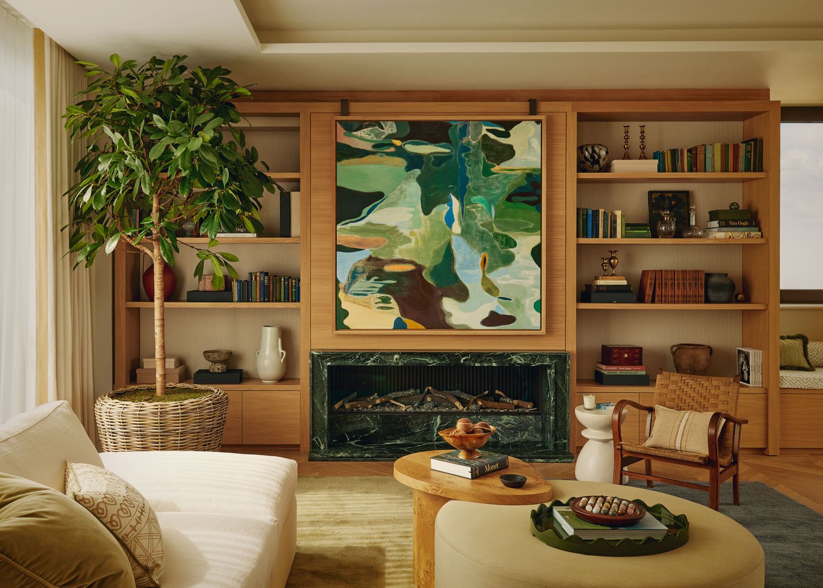 Image may contain Chair Furniture Architecture Building Indoors Living Room Room Book Publication and Plant