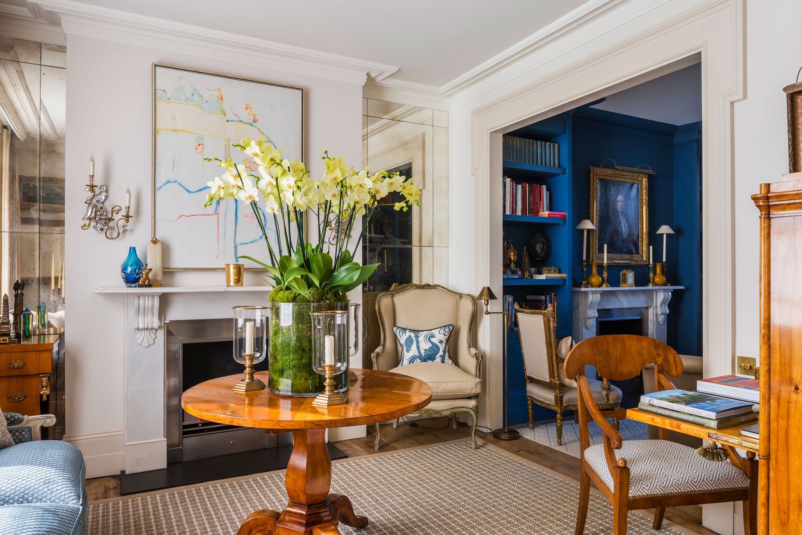 Image may contain Home Decor Architecture Building Furniture Indoors Living Room Room Table and Chair