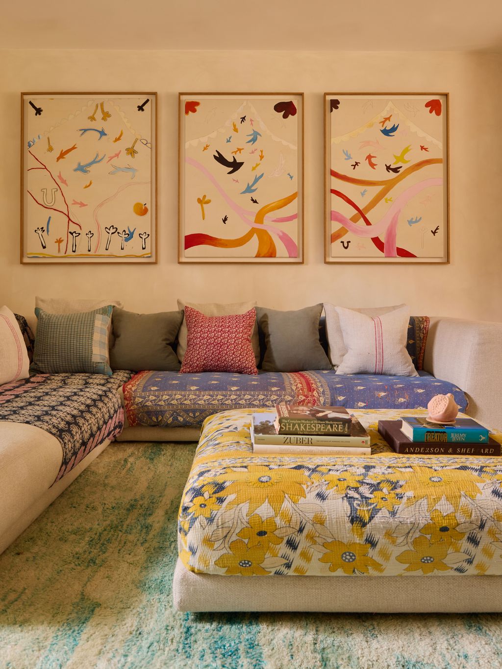 Image may contain Home Decor Cushion Book Publication Furniture Art Painting Couch Indoors and Interior Design