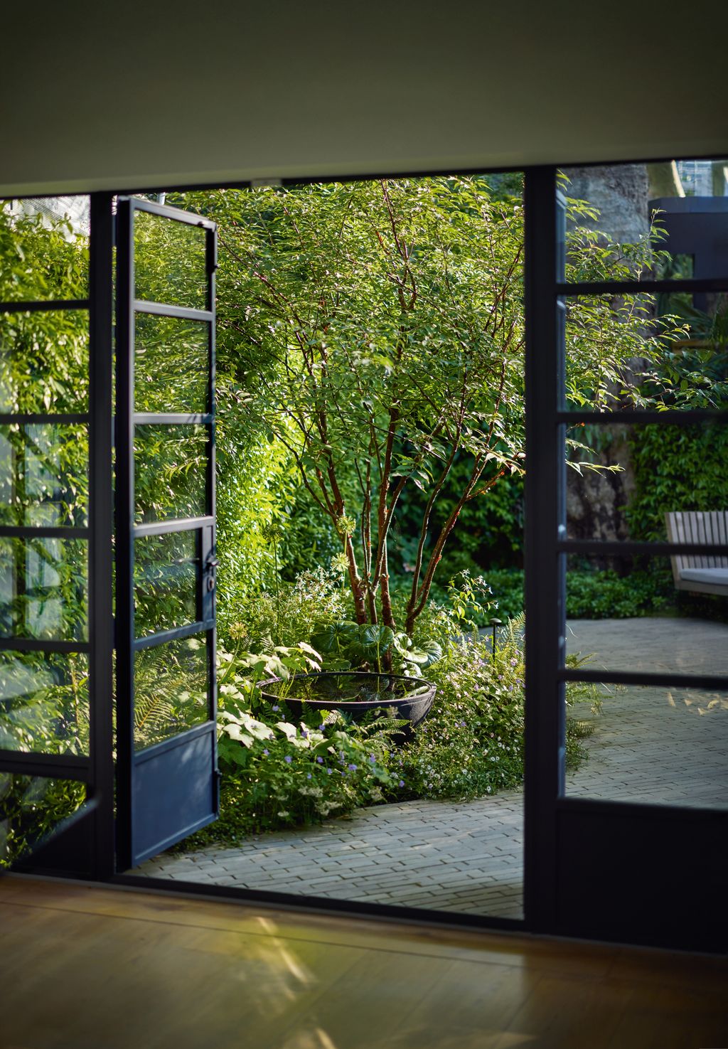 Image may contain Door Bench Furniture Architecture Building Housing Indoors Interior Design and House