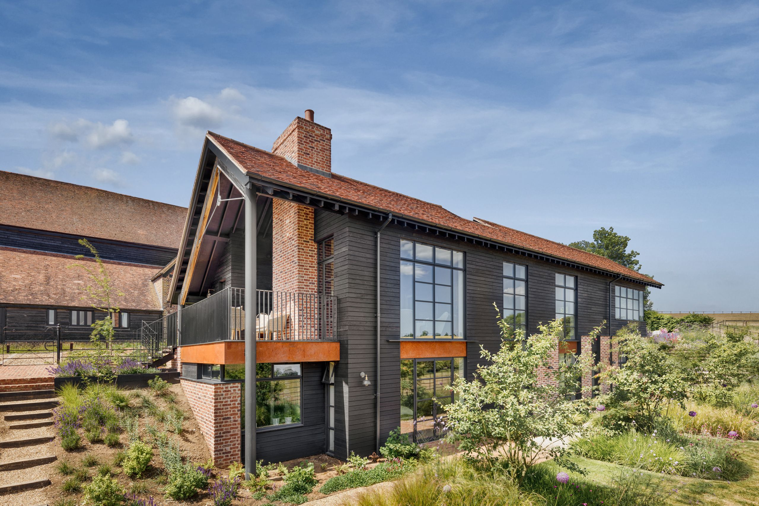 Image may contain: Architecture, Building, Housing, Cottage, House, and Row House