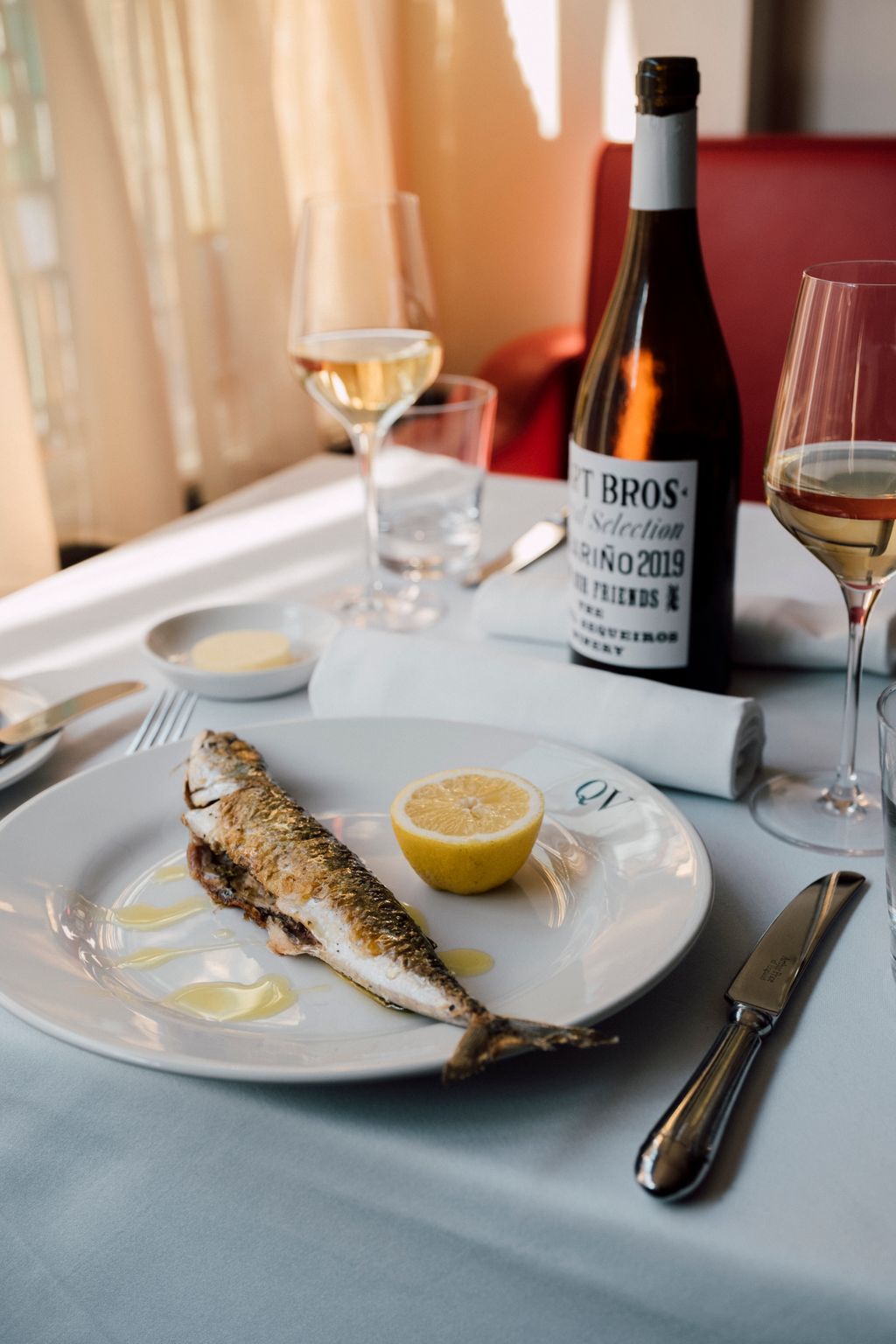 Image may contain Plate Blade Knife Weapon Cutlery Fork Food Food Presentation Cup Glass and Dining Table