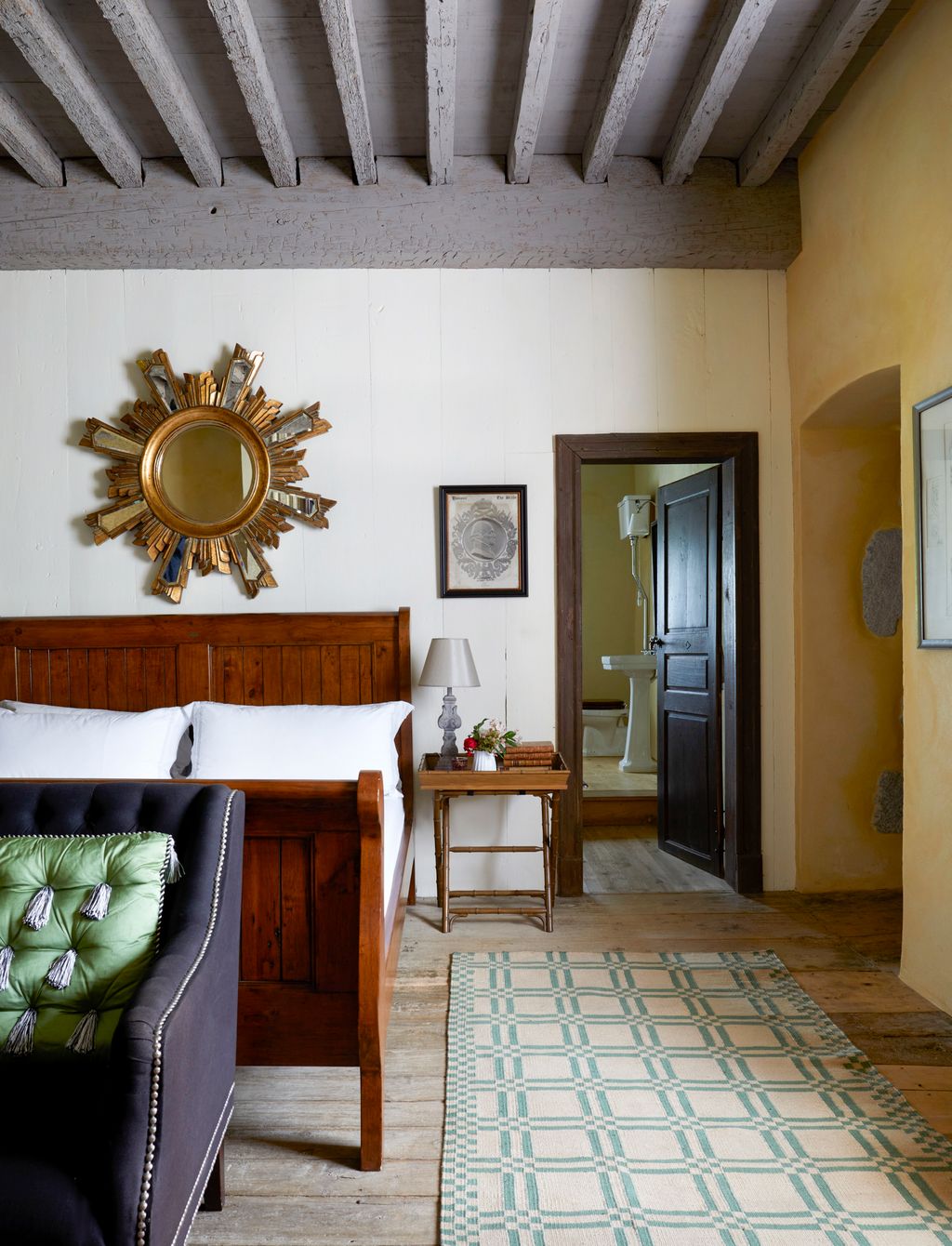 Image may contain Indoors Interior Design Home Decor Lamp Floor Rug Desk Furniture Table Bed Art and Painting