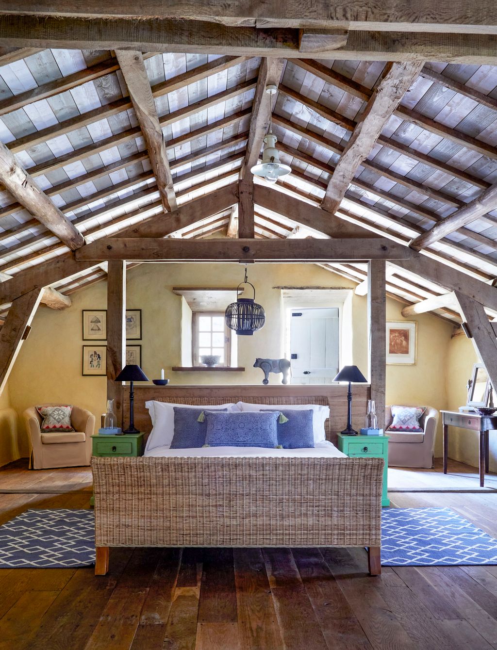 Image may contain Lamp Indoors Art Painting Bed Furniture Desk Table Home Decor Rug Couch Bedroom and Room