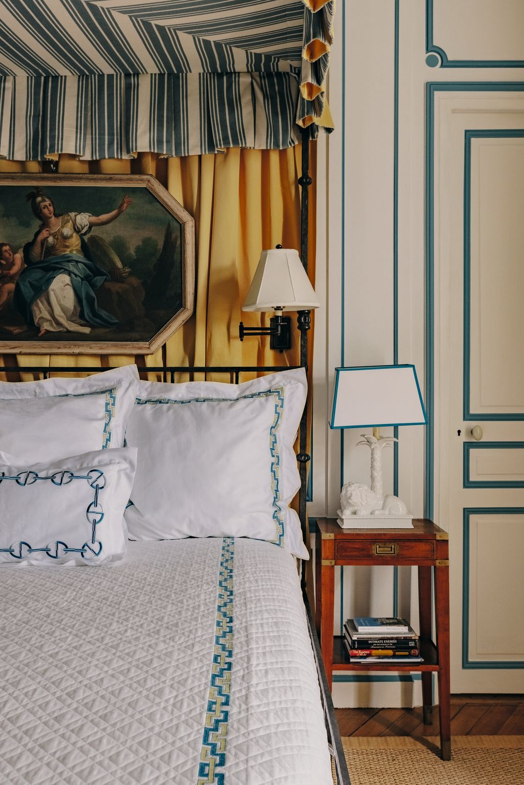 Image may contain Lamp Cushion Home Decor Indoors Interior Design Bed Furniture Art Painting Person and Table Lamp