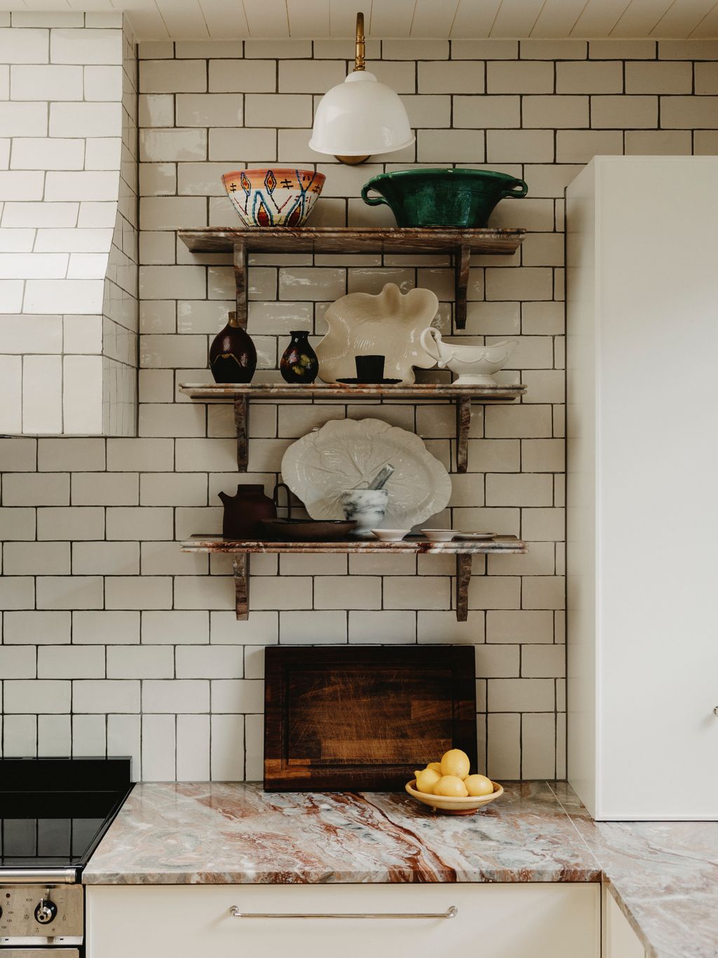 Image may contain Indoors Interior Design Lamp Cup Kitchen and Plate