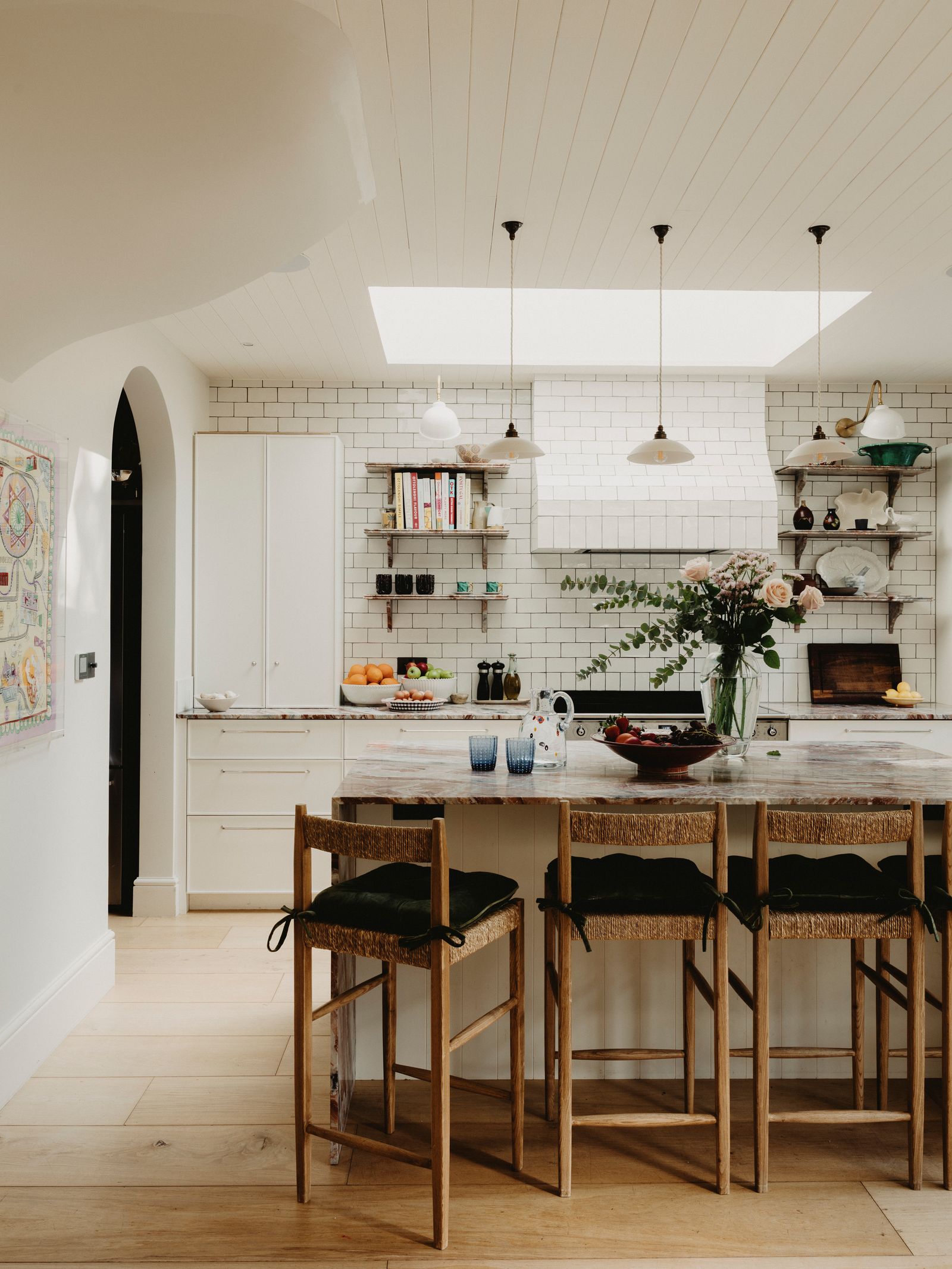 Image may contain Indoors Interior Design Architecture Building Dining Room Dining Table Furniture Room and Table