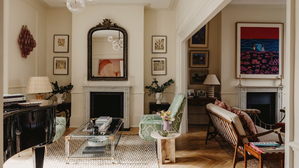 Image may contain Home Decor Furniture Table Architecture Building Indoors Living Room Room Lamp and Rug