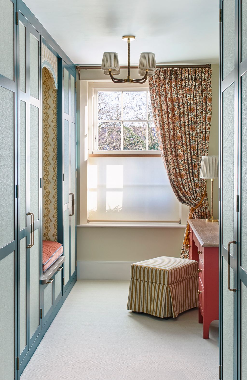 Image may contain Lamp Door Chandelier Indoors Furniture Interior Design Bed and Window