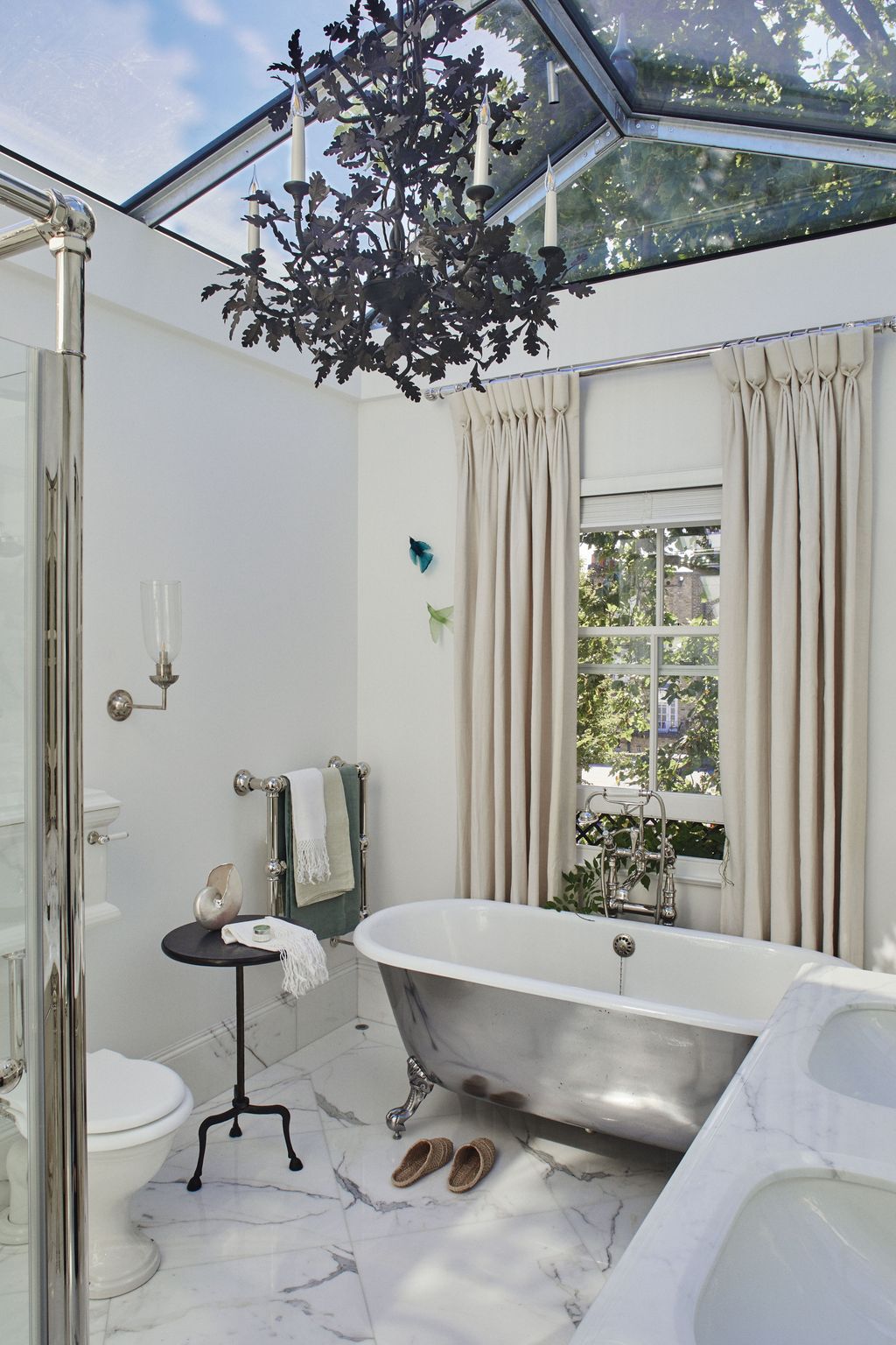 Image may contain Bathing Bathtub Person Tub Clothing Footwear Shoe Lamp Candle Indoors Bathroom Room and Toilet