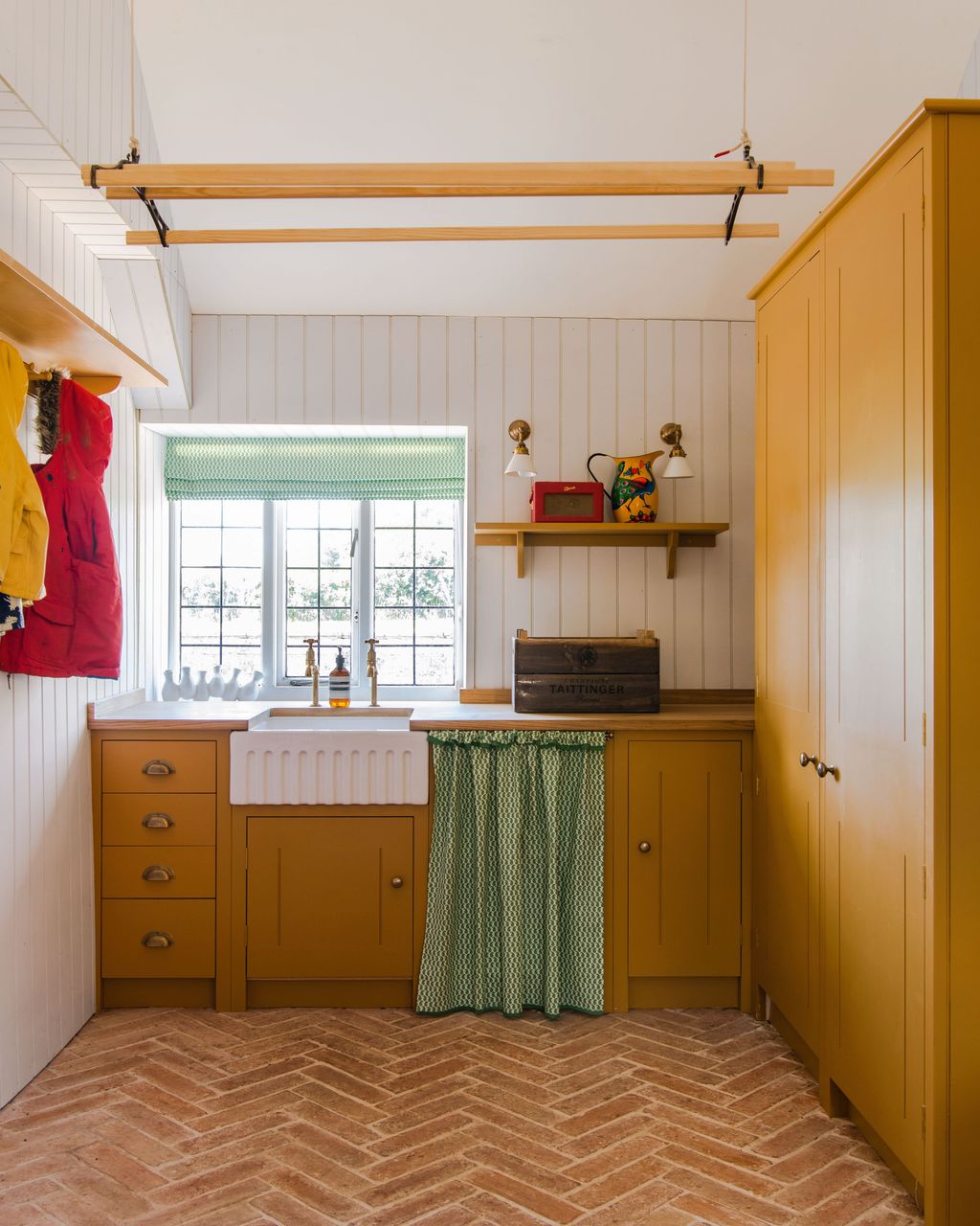 Image may contain Indoors Interior Design Floor Sink Box Flooring Kitchen and Wood Panels