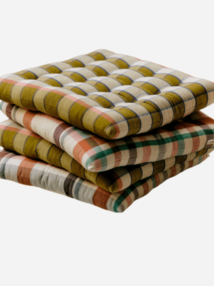 Image may contain Cushion Home Decor Blanket and Pillow