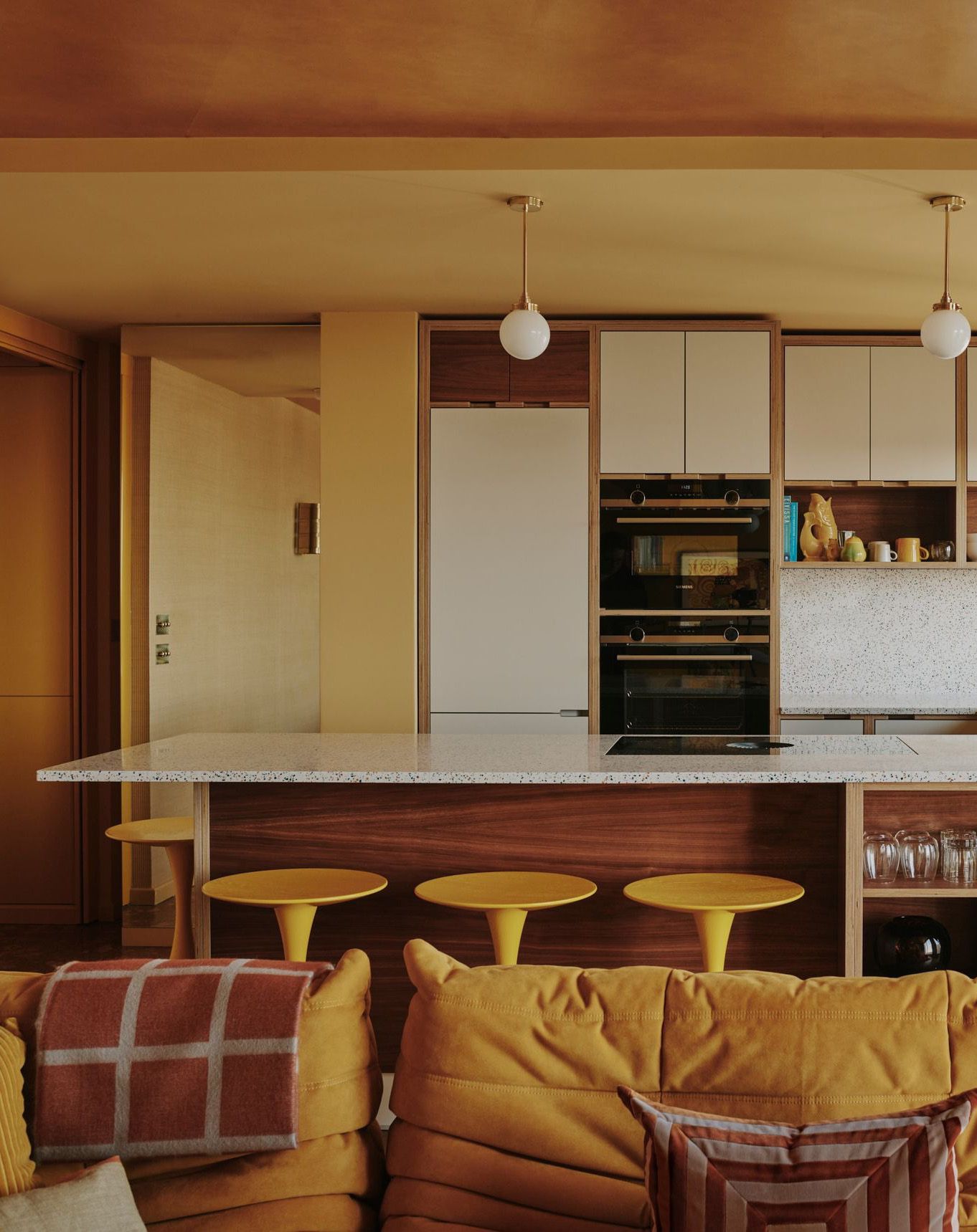 Image may contain Indoors Interior Design Lamp Home Decor Kitchen Cup Couch Furniture Appliance and Device