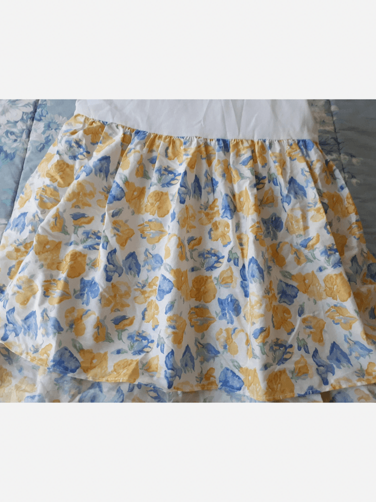 Image may contain: Clothing, Skirt, and Miniskirt