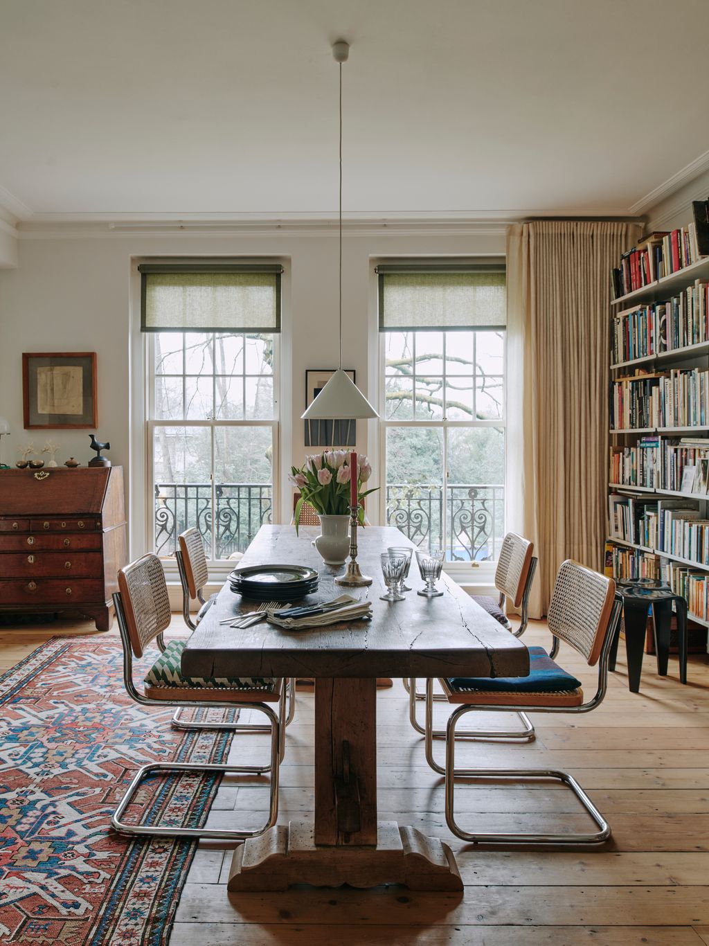 Image may contain Furniture Table Chair Tabletop Dining Table Home Decor Architecture Building and Dining Room