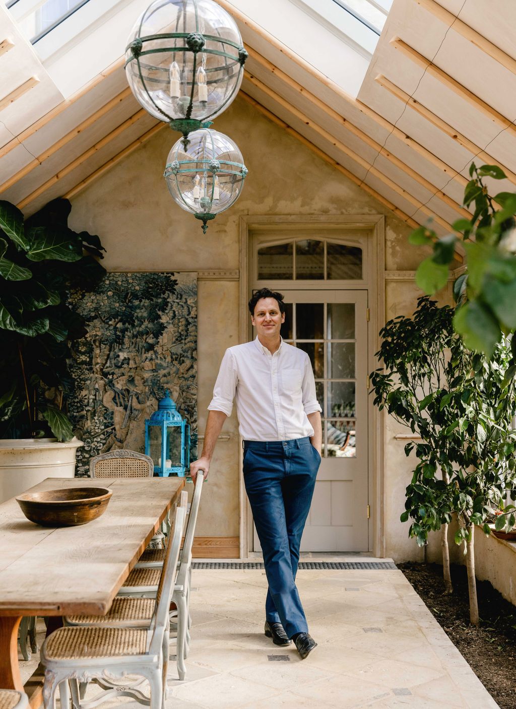 Image may contain Casper Andreas Clothing Pants Person Standing Adult Jeans Plant Footwear Shoe and Chair