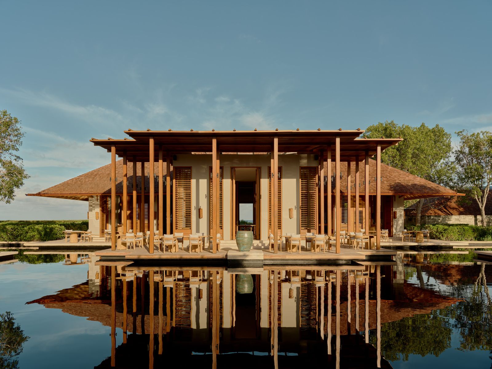 Image may contain Nature Outdoors Scenery Architecture Building House Housing Villa Water Waterfront and Hotel