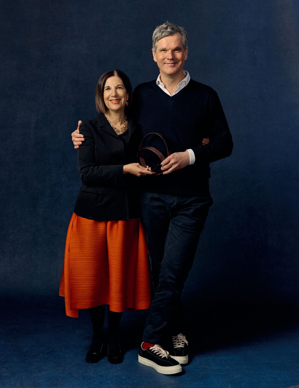 Image may contain Fabiola Gianotti Clothing Footwear Shoe Face Head Person Photography Portrait Skirt and Adult