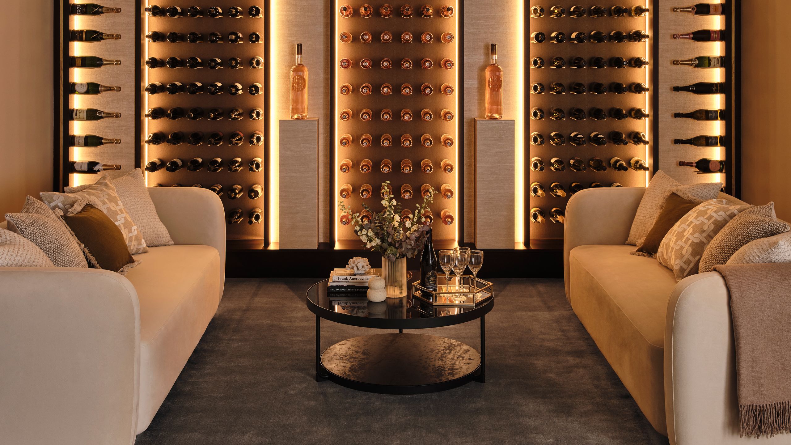 Image may contain: Alcohol, Beverage, Liquor, Wine, Couch, Furniture, Wine Cellar, Architecture, Building, and Indoors