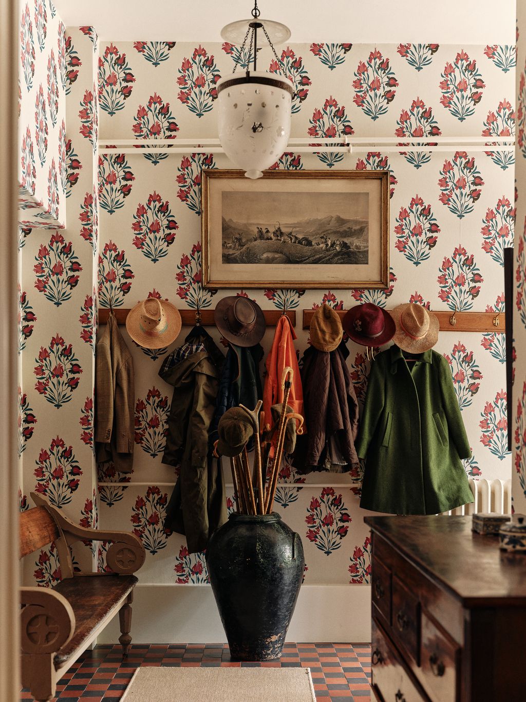 Image may contain Dressing Room Indoors Room Art Painting Clothing Hat Interior Design Lamp Home Decor and Rug