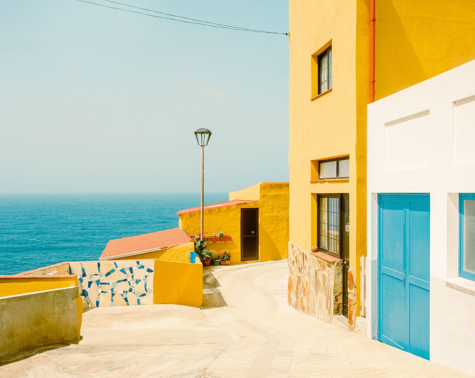 Image may contain Architecture Building House Housing Villa City Road Street Urban Path Neighborhood and Nature